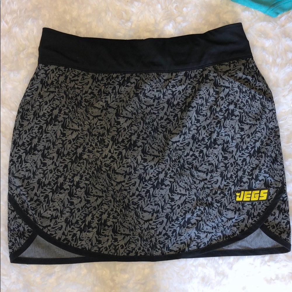 Grey Adidas golf or tennis skort